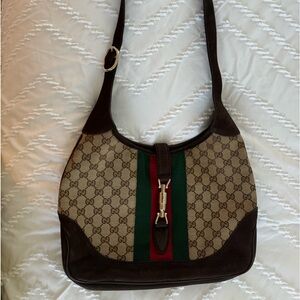 Gucci crossbody purse.